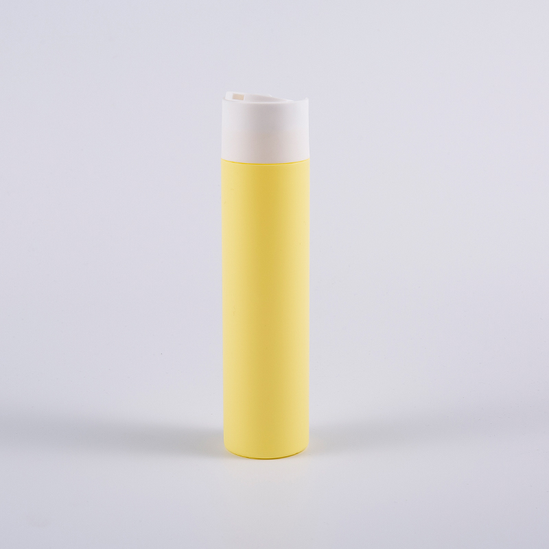 ディスク キャップが付いている複数の色のソフト タッチの円形の 250 ml のクレンジング ボトル