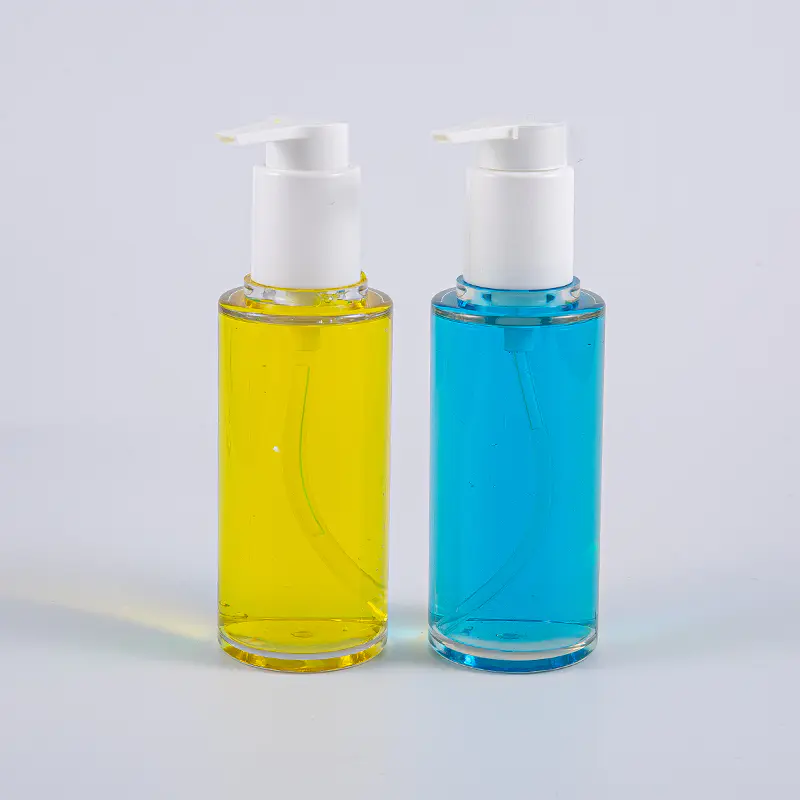 白いプラスチック ポンプが付いている明確な PETG 100ml の円形のローション ボトル